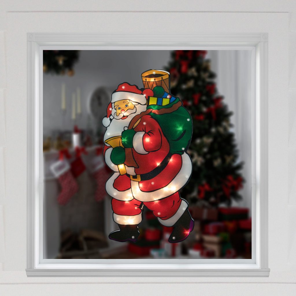 trang trí noel cho cửa kính với hình xốp ông già noel phác quà