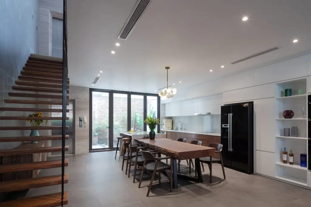 bàn ăn gỗ óc chó nguyên tấm